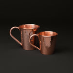 18 ounce and 12 ounce copper Moscow Mule mugs side by side to compare sizes